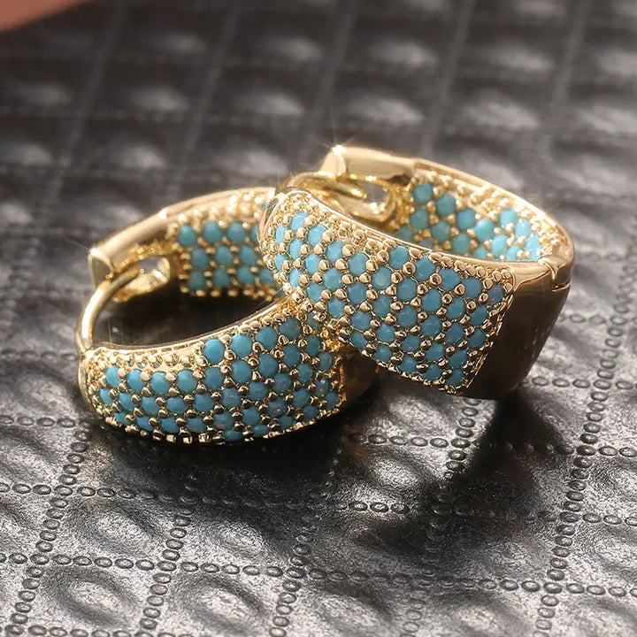 Pendientes de cuentas en tono dorado con turquesa | Oro