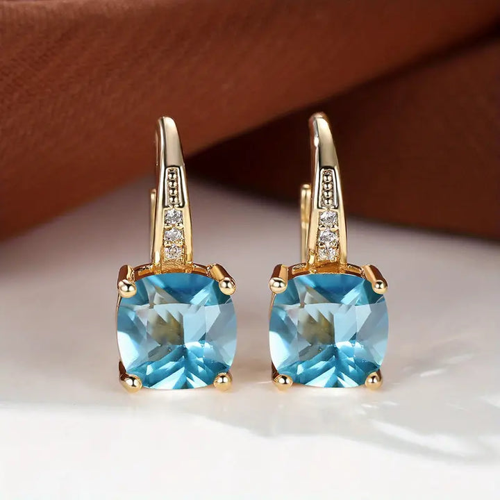 Pendientes circulares de piedra mística | Oro