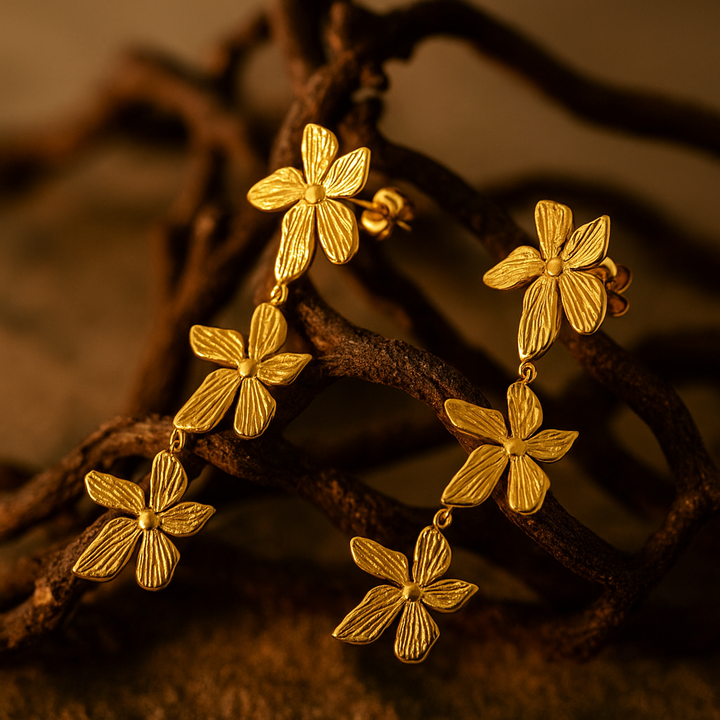 Aurora | Pétalos en el viento chapados en oro