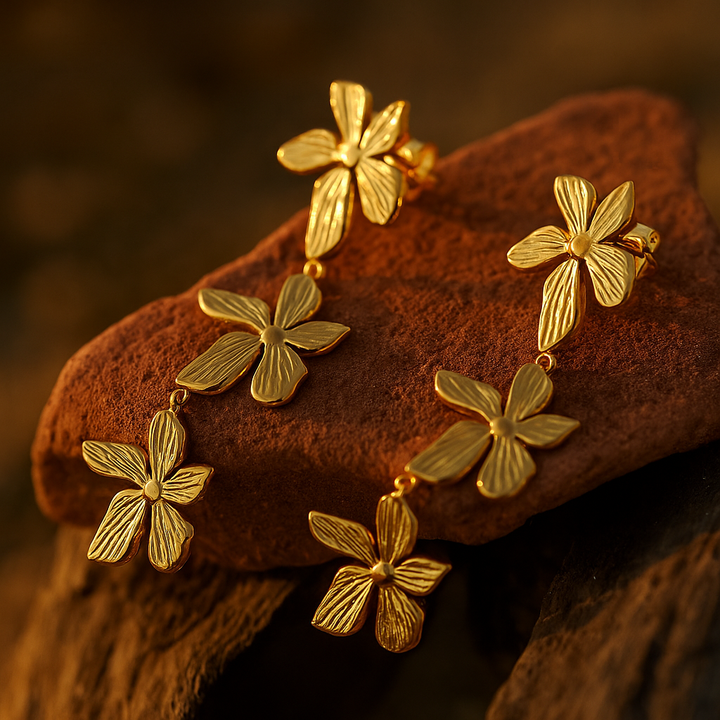 Aurora | Pétalos en el viento chapados en oro