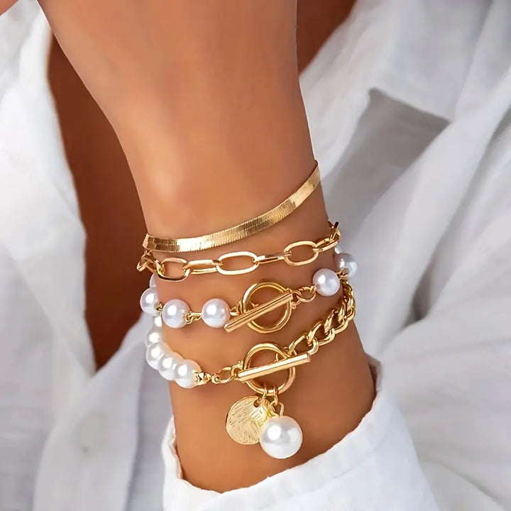 Conjunto elegante de pulseras - serpiente, perlas y eslabones | Oro