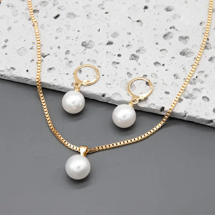 Conjunto de joyería de perlas doradas | Oro